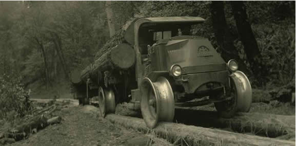 Figure 1.3. Mack truck with flange wheels on “fore and aft” pole road (Coos Historical and Maritime Museum).